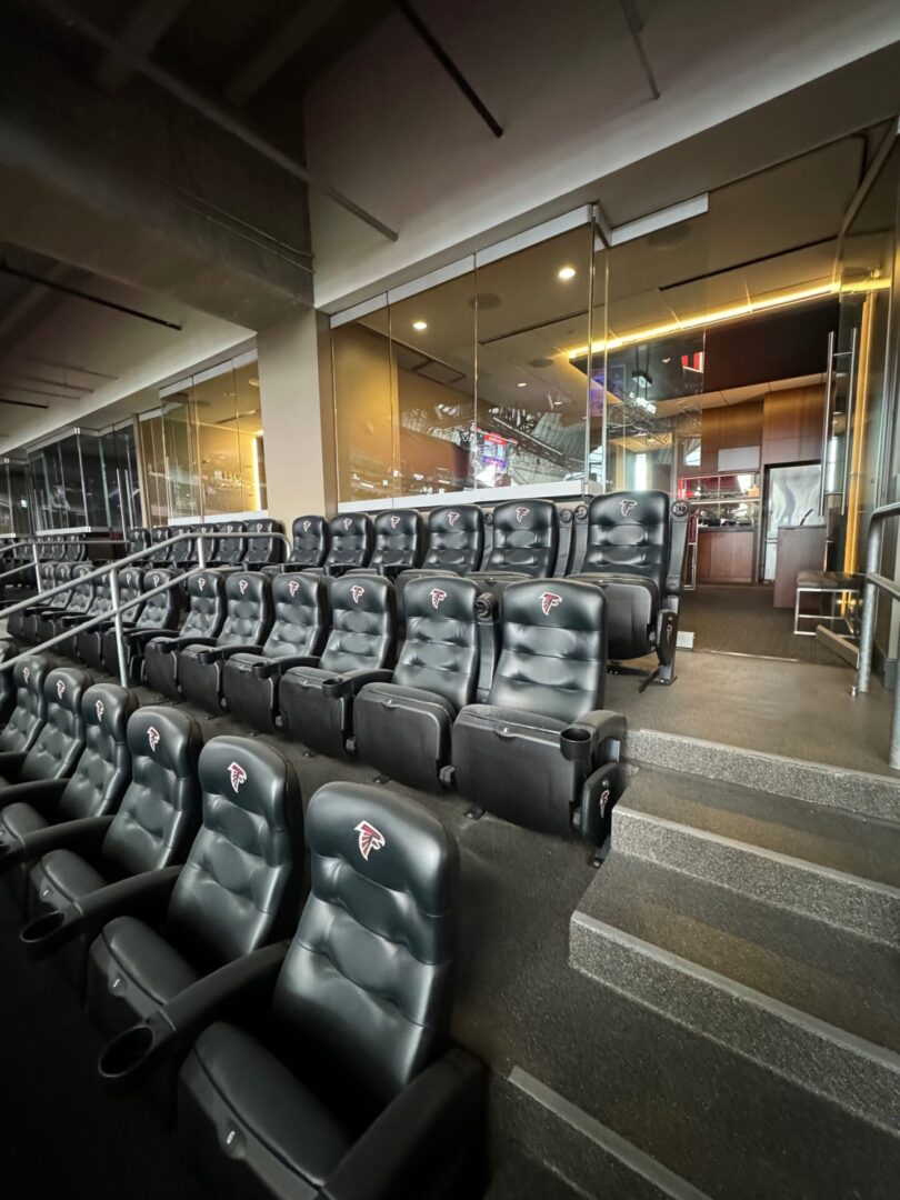 A group of seats in an empty stadium.
